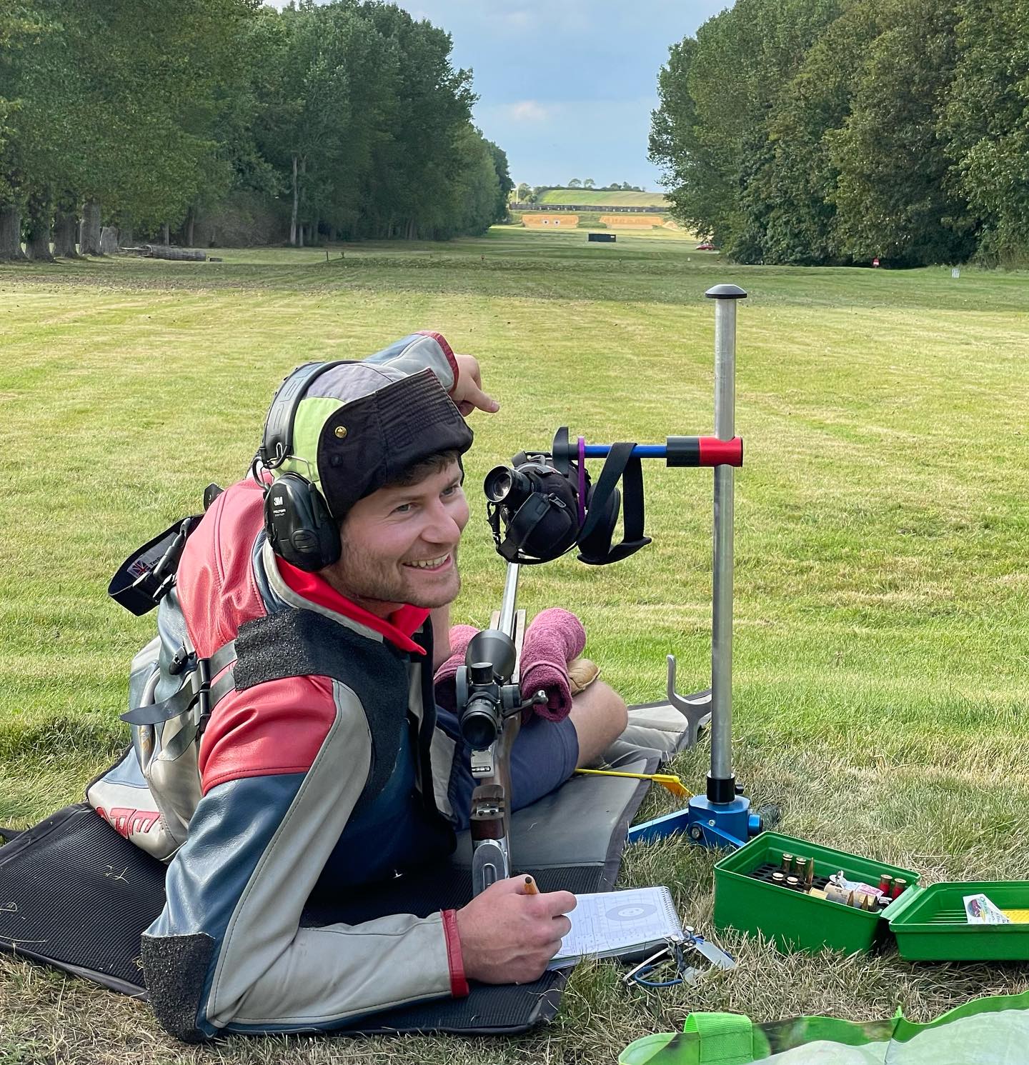 A CURA shooter lying prone behind a rifle on the range