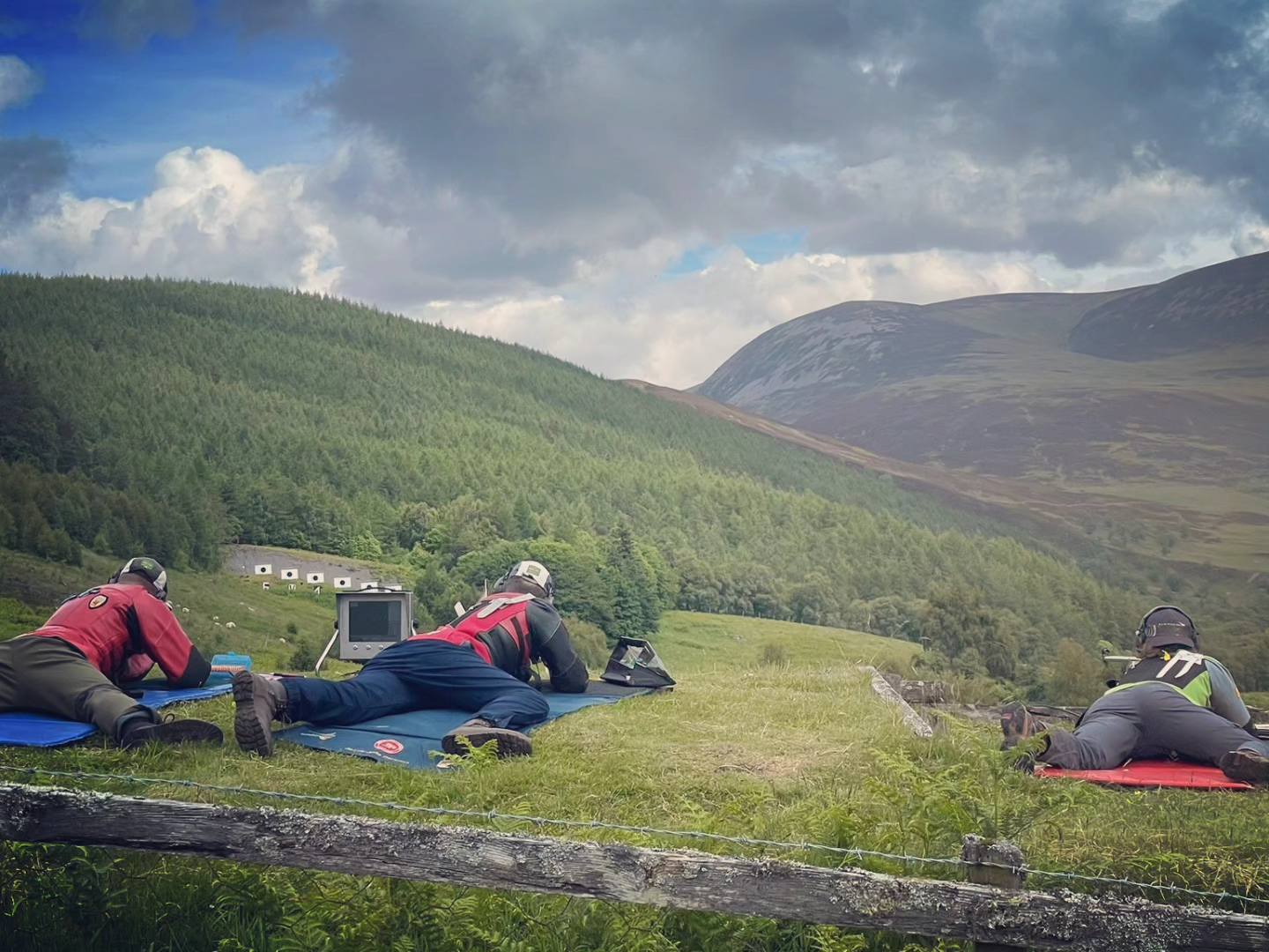 Shooters lying prone on the hillside range at the Scottish Open