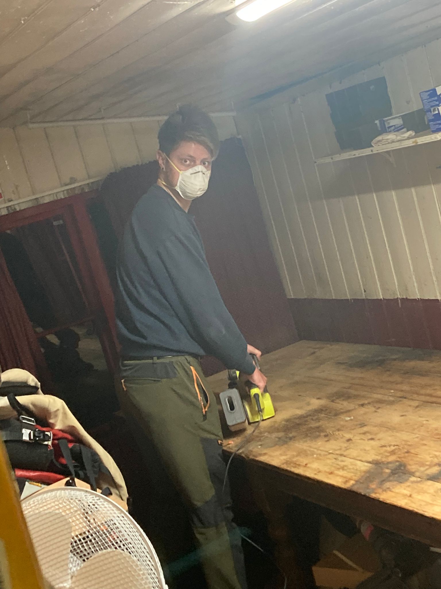 After being teased about his plans for months, our Captain was caught in action sanding the gunroom table
